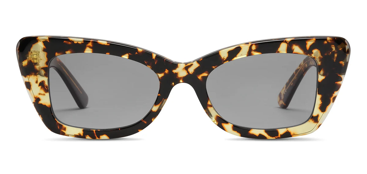 The SALT. Tory cat-eye sunglasses by SALT. are crafted from premium Japanese acetate, featuring a glossy tortoiseshell patterned frame and dark polarized optical lenses, shown from the front on a white background.