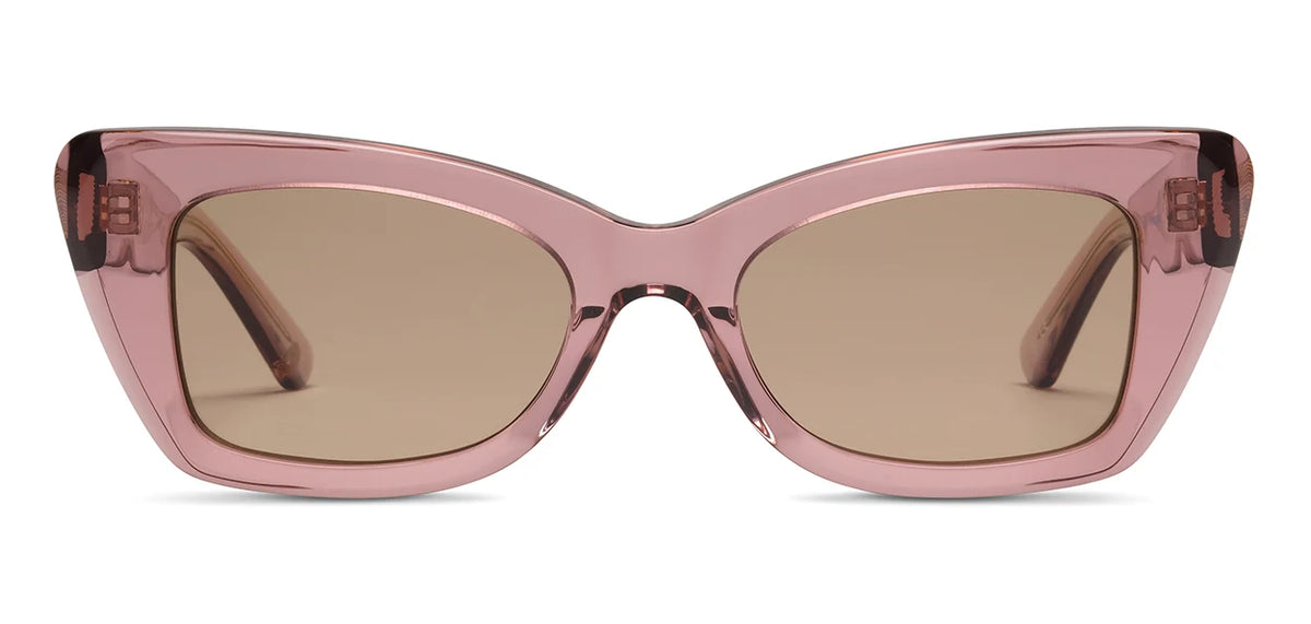 The SALT. Tory sunglasses by SALT. feature pink cat-eye frames with thick, translucent Japanese acetate and brown-tinted polarized optical lenses, meticulously crafted in Japan and displayed from the front on a white background.