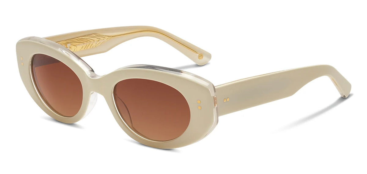 The SALT. Cass by SALT. features a retro-inspired design with a thick, glossy beige oval frame crafted from premium Japanese acetate. Brown lenses with anti-reflective coatings enhance visual comfort, while gold accents on the front and inner arms provide refined detailing.