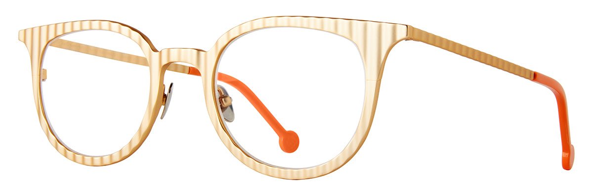 Cream and tan striped optical glasses with rounded lenses, slim matching temples, adjustable nose pads, and bright orange temple tips shown at an angled side view on a white background.