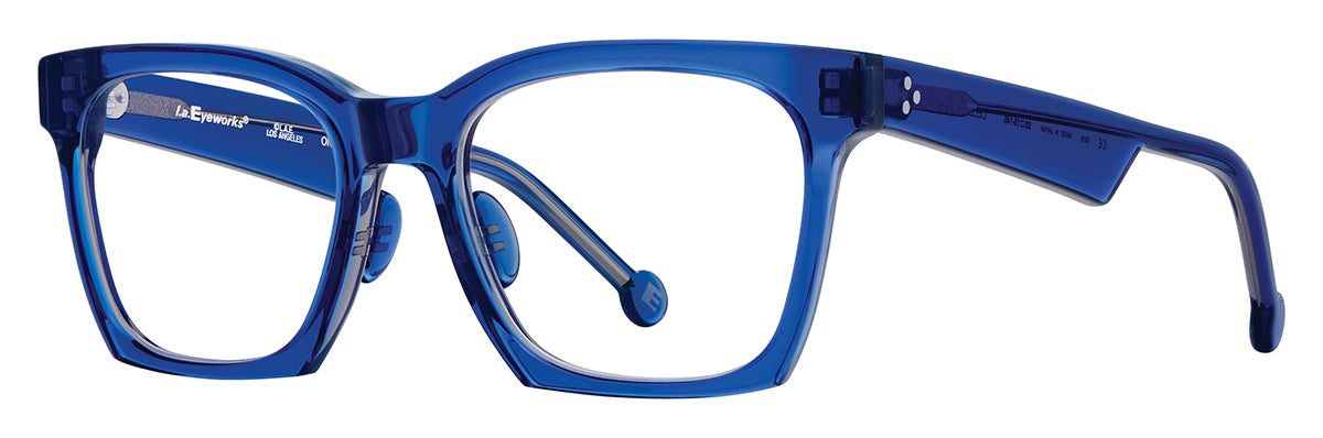 Handmade in Japan, these translucent blue L.A. Eyeworks Cello acetate eyeglasses feature a rectangular shape with thick frames and matching temple arms.