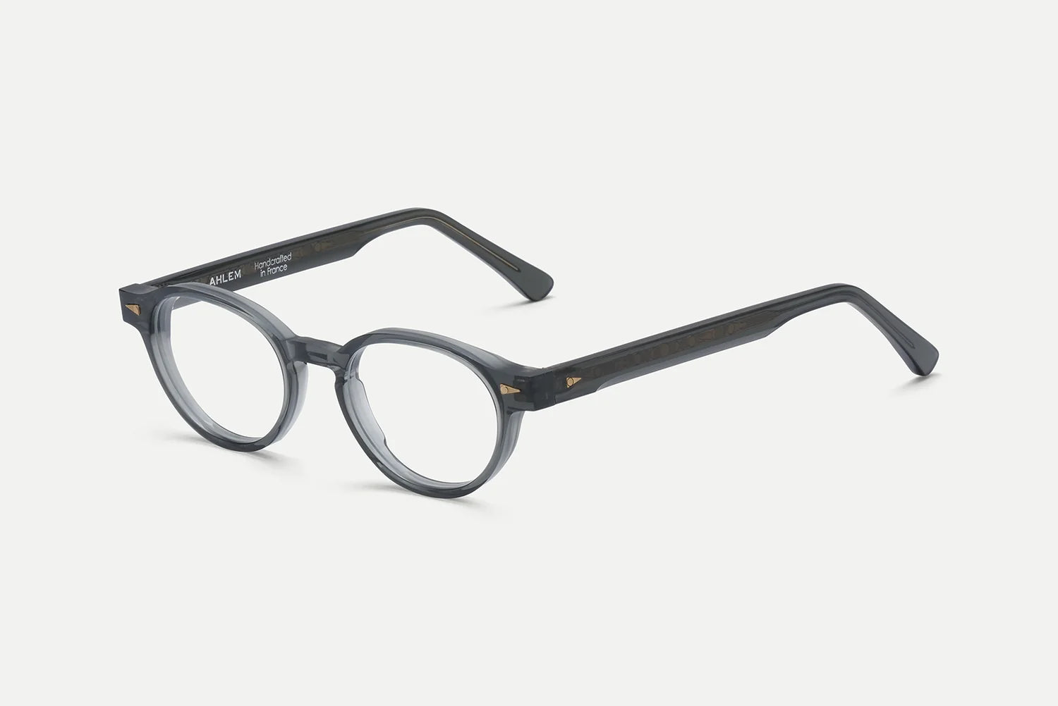 AHLEM St Marcel round eyeglasses by AHLEM, crafted from thick, dark gray premium Italian acetate with straight temple arms, displayed on a plain white background.