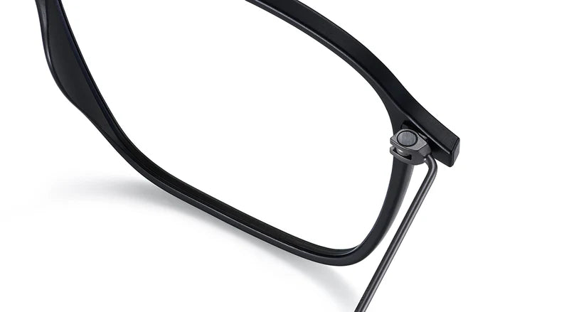 Close-up of the top corner of lool Fipple eyeglass frames by LOOL, highlighting the screwless hinge and a section of the temple arm against a white background—a refined example of lightweight eyewear from a Barcelona design studio.