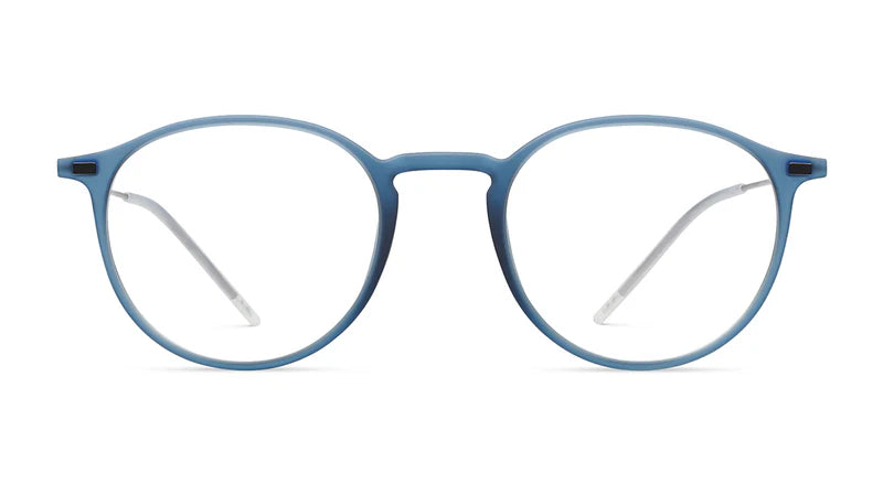 The LOOL lool Hangar 2 47 eyeglasses feature a round, matte light blue frame and clear lenses, shown front-facing against a white background. Designed with a screwless hinge inspired by Barcelona design, this lightweight eyewear from LOOL combines style and comfort.