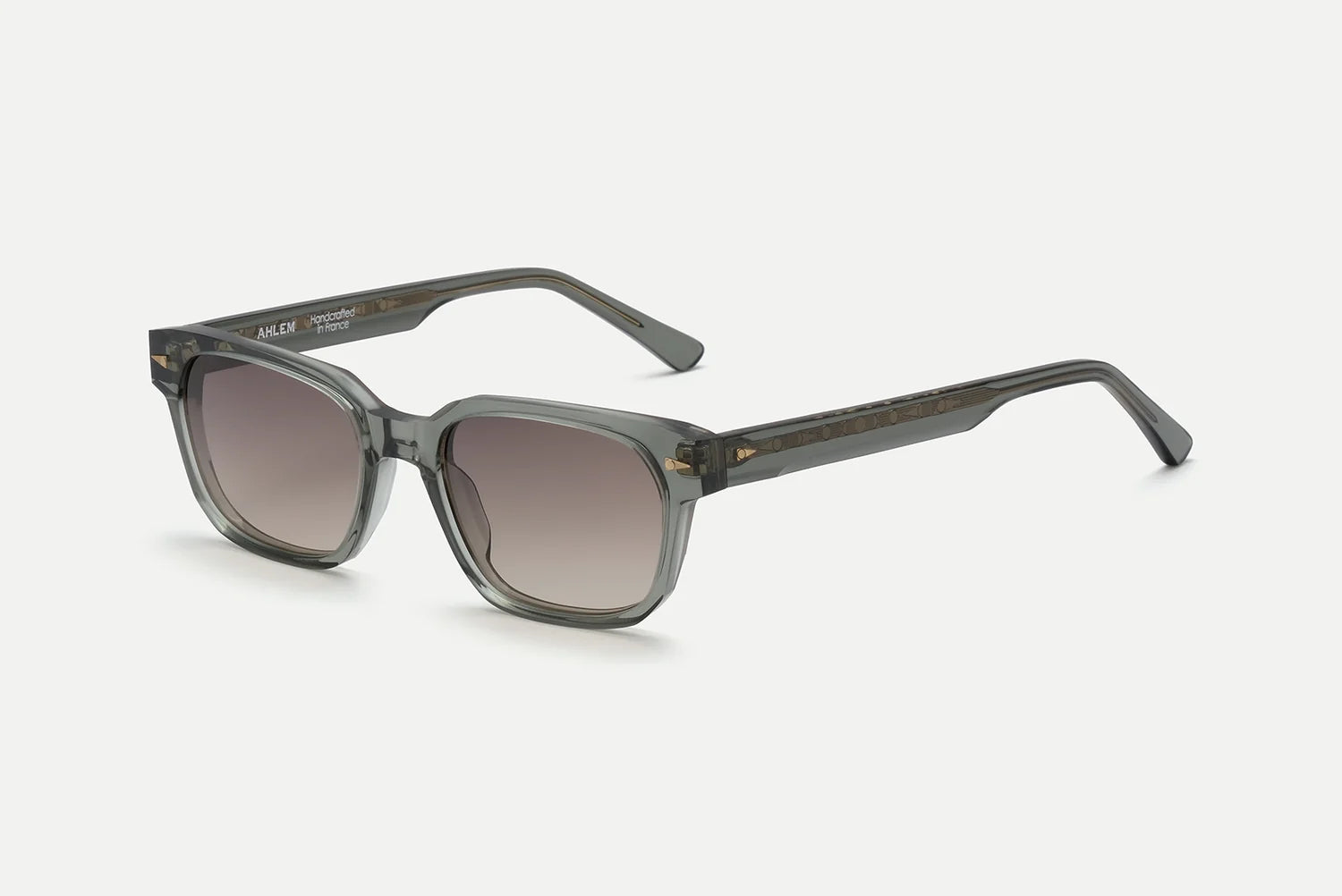 AHLEM Sedaine sunglasses by AHLEM, shown at a slight angle on a plain light background. These luxury French eyewear pieces are handcrafted from acetate in a gray square-frame design with gradient dark lenses and feature straight arms with subtle hinge detailing.