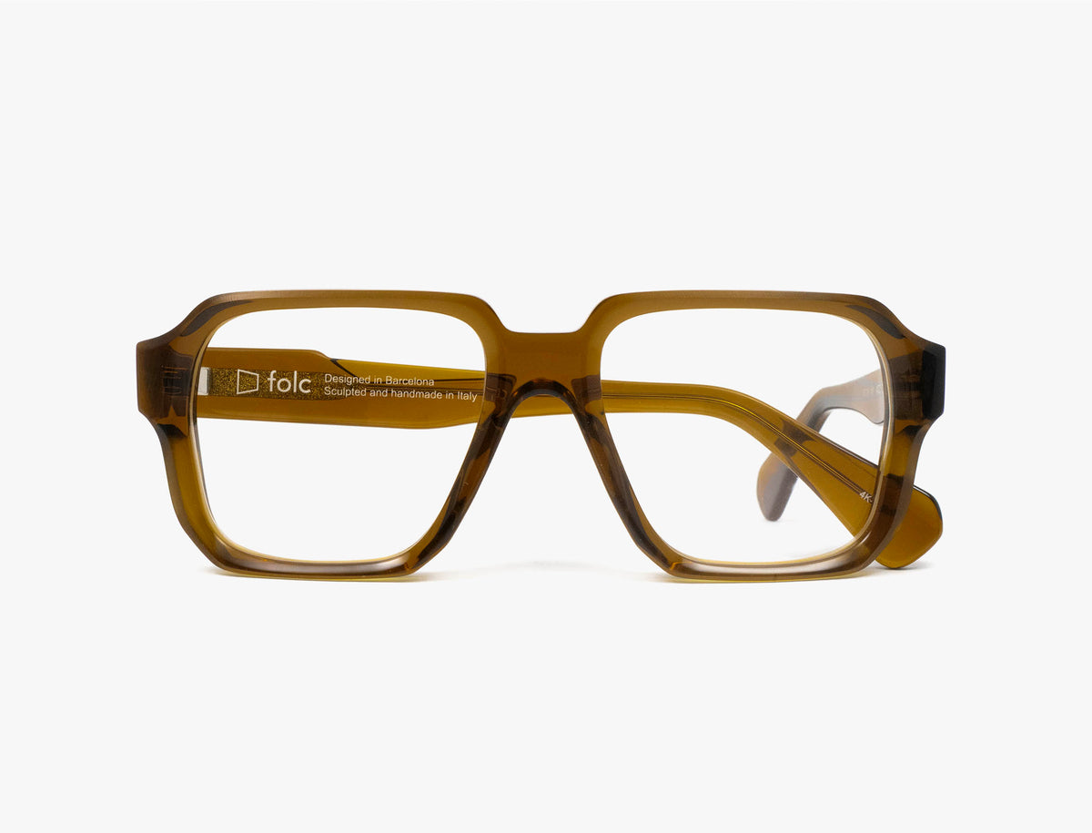 Folc Acondri amber-colored, square-framed glasses with thick rims made from Italian acetate.