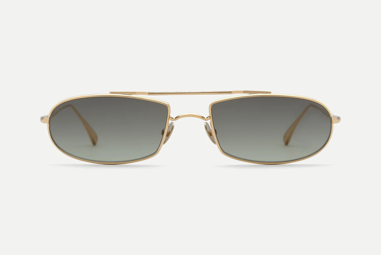 The AHLEM Guerin sunglasses by AHLEM feature gold-finished aviator frames and dark gradient lenses, handcrafted in France. Displayed front-facing on a plain white background, these unisex sunglasses provide 100% UV protection for both style and safety.