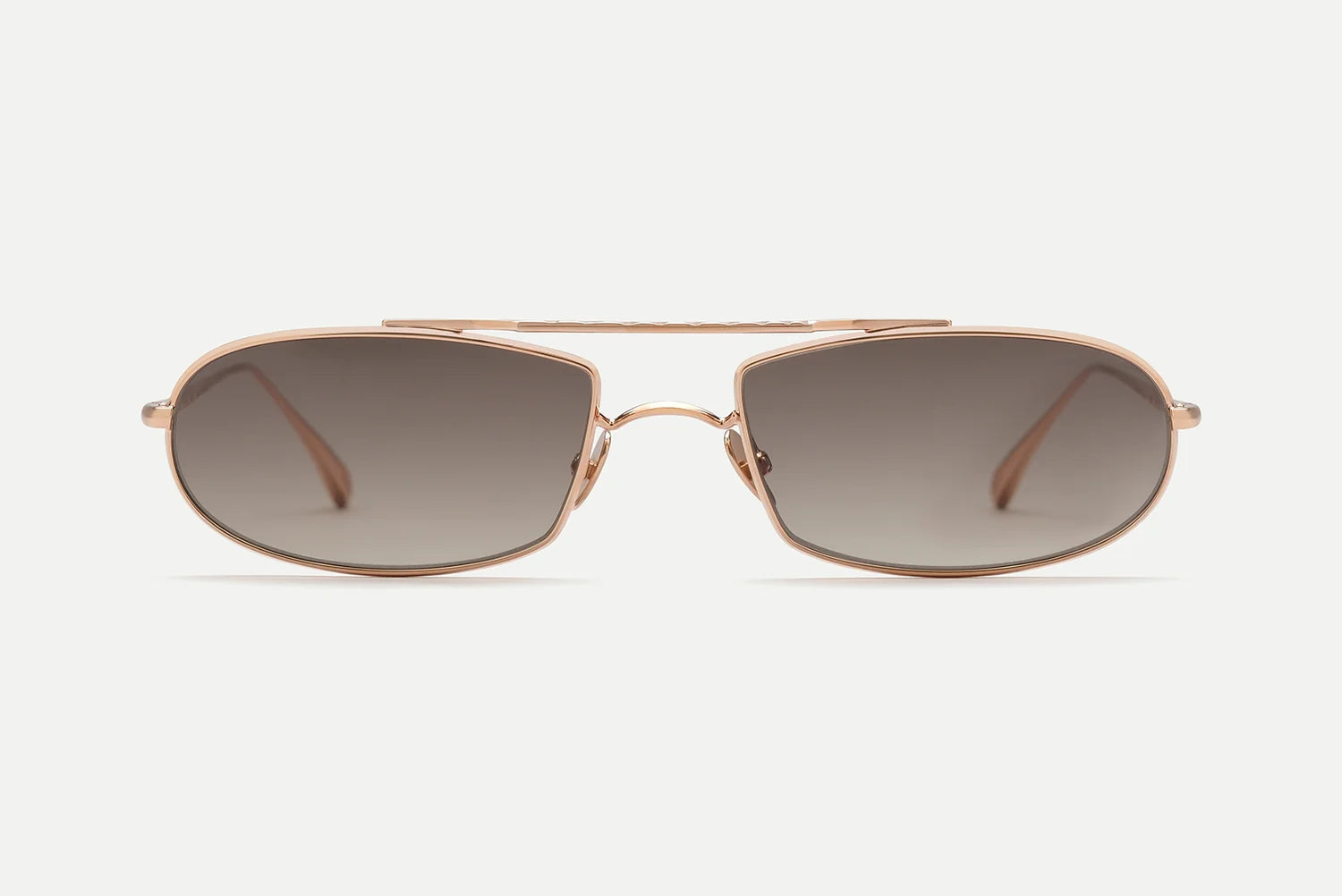 The AHLEM Guerin by AHLEM are gold-framed aviator sunglasses featuring dark gradient lenses, displayed on a plain white background and facing directly forward. These unisex sunglasses are handcrafted in France and provide 100% UV protection.