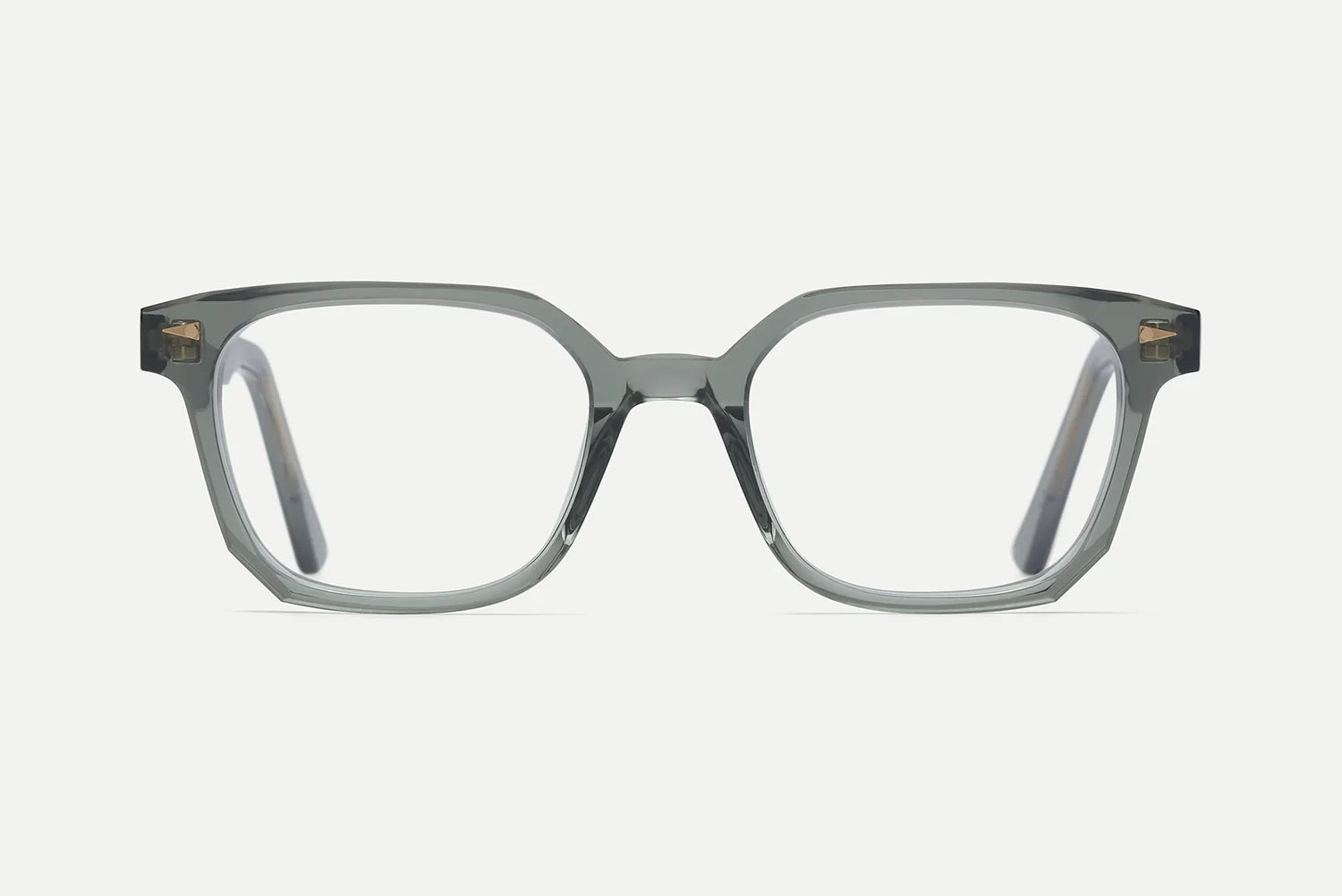 The AHLEM Houdon by AHLEM showcases gray, rectangular eyeglass frames with thick acetate rims, handcrafted and featuring premium steel hardware, presented from the front against a plain white background.