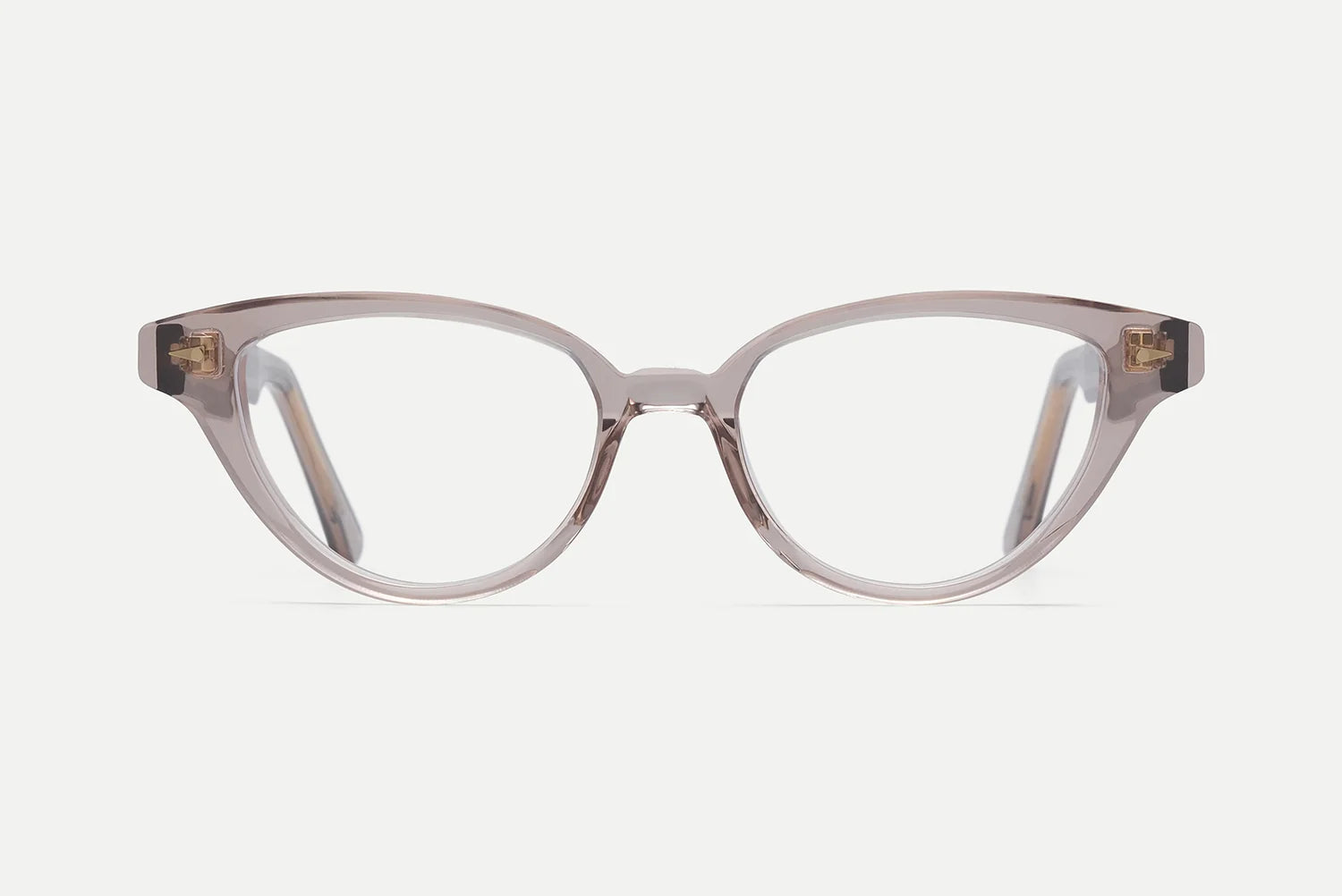 The AHLEM Lilas optical glasses by AHLEM feature clear cat-eye frames with a subtle silhouette, handcrafted in France from plant-based Italian acetate, displayed from the front against a plain white background.