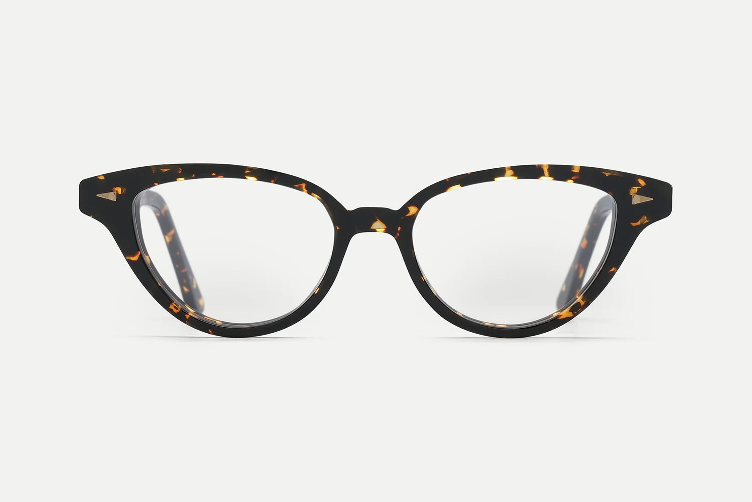The AHLEM Lilas cat-eye optical glasses by AHLEM feature a tortoiseshell pattern on the frames and are handcrafted in France from plant-based Italian acetate, shown against a plain white background.