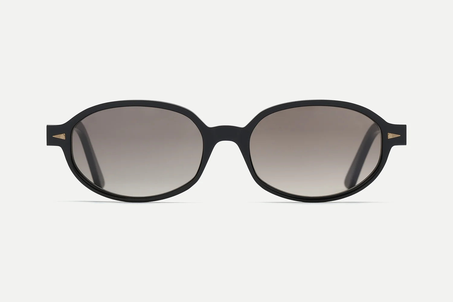 Front view of the AHLEM Rohan sunglasses by AHLEM—black, round frames with dark gradient lenses, handcrafted in France from premium Italian acetate—displayed against a plain white background.