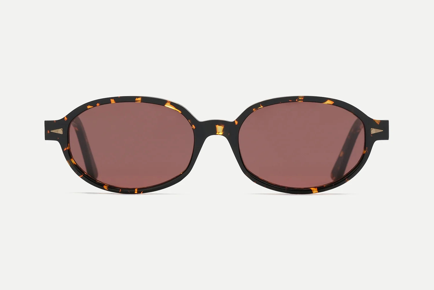 AHLEM Rohan sunglasses by AHLEM, featuring round lenses and a keyhole bridge in brown tortoiseshell premium Italian acetate, handcrafted in France and shown from the front against a plain white background.