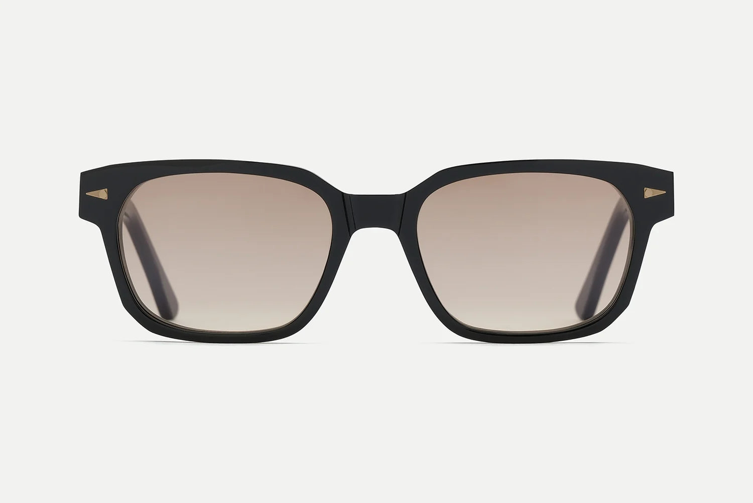 The AHLEM Sedaine sunglasses by AHLEM feature a black rectangular silhouette with thick Italian acetate frames, slightly tinted lenses providing 100% UV protection, and subtle gold triangle accents on the upper corners. Meticulously handcrafted, they are presented against a plain white background.