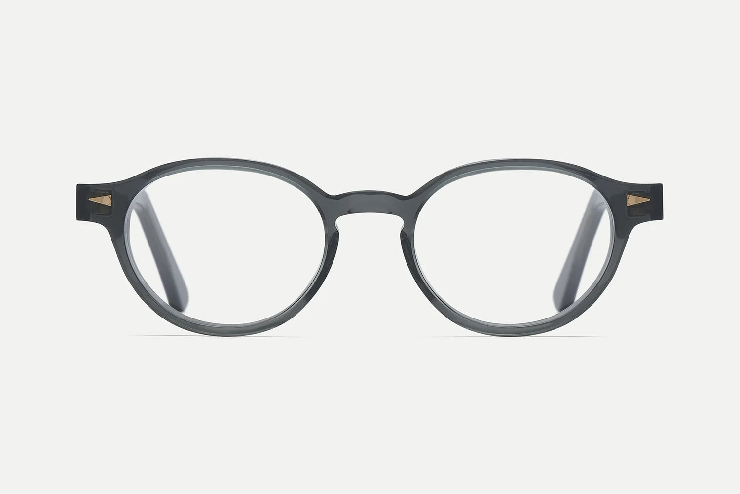 Front-facing view of the AHLEM St Marcel eyeglasses by AHLEM, featuring round, gray frames crafted from premium Italian acetate with subtle metallic accents at the hinges and clear lenses, set against a plain white background.
