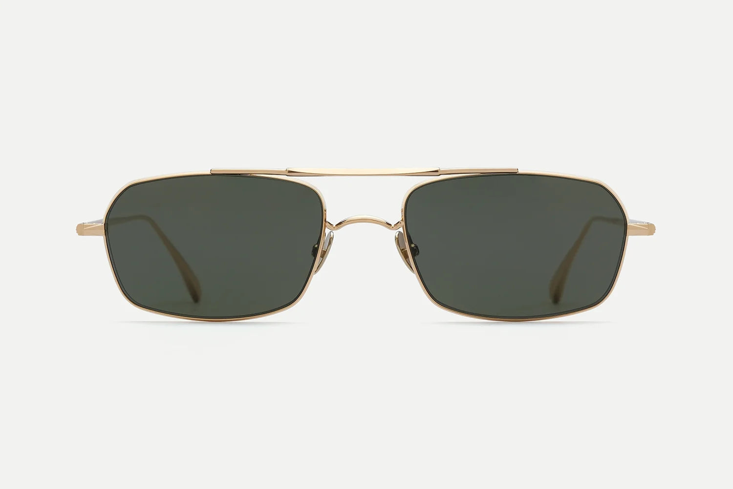 Introducing the AHLEM Trevise by AHLEM: handcrafted in France, these rectangular aviator sunglasses feature 22k gold frames and dark lenses, shown front-on against a plain white background.