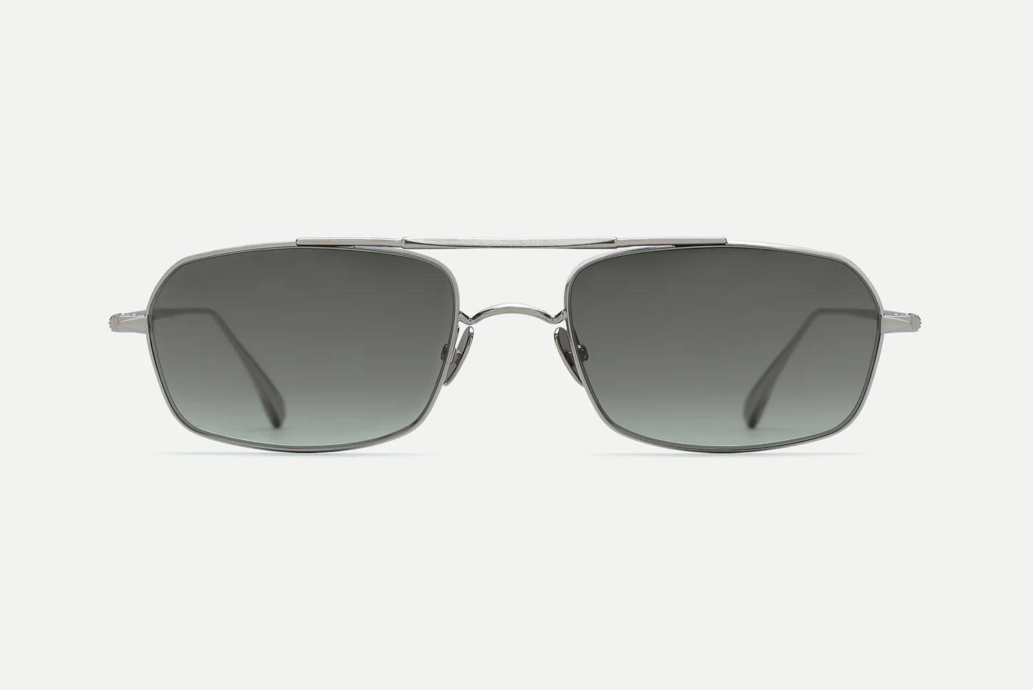Front view of AHLEM Trevise handcrafted rectangular aviator sunglasses by AHLEM, featuring a metal frame, rectangular dark lenses, and a slim top bridge, displayed on a plain white background.