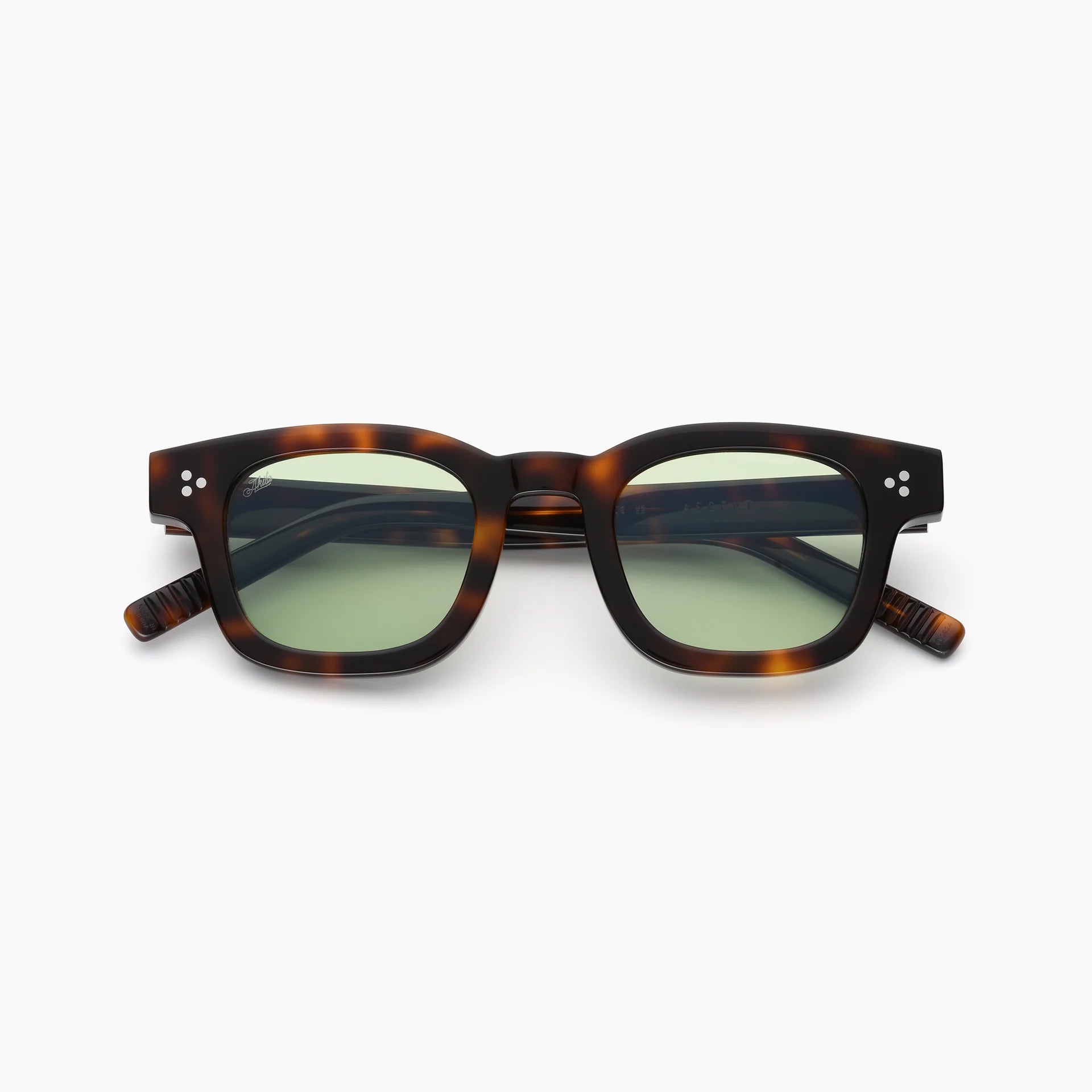 Dark tortoise square acetate sunglasses with green lenses, white rivet accents, and thick temples, shown front-facing on a white background.