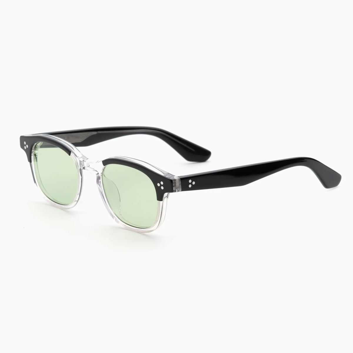 The Akila Atria sunglasses by Akila feature round green-tinted lenses set in clear frames, complemented by thick glossy black arms. Designed to provide a medium fit and a balanced silhouette, they are presented against a plain white background.