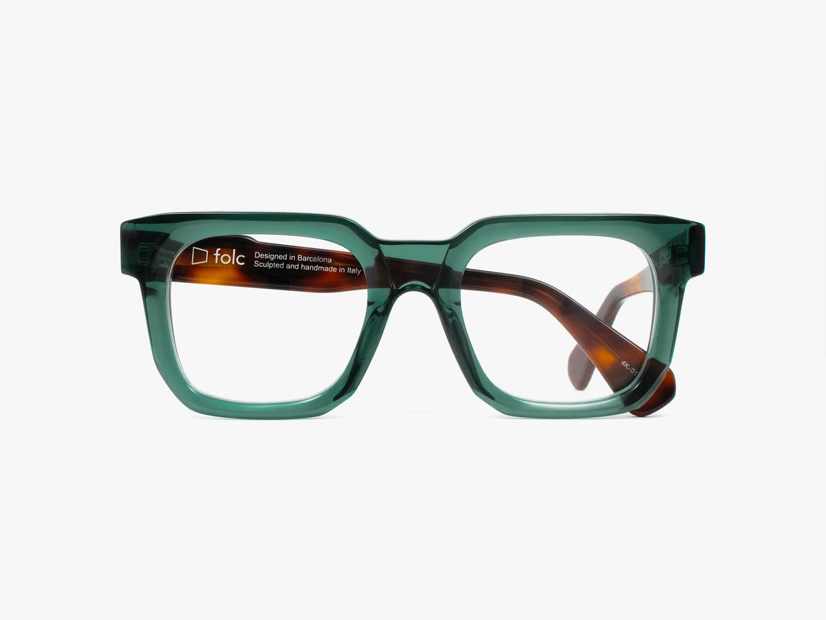 Folc Biel square-framed contemporary eyewear with translucent green rims and dark tortoiseshell arms.