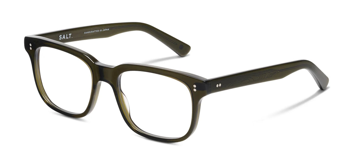 Introducing the SALT. Campbell by SALT.—olive green acetate eyeglasses featuring oversized rectangular frames, thick profiles, a subtle woodgrain texture, and two small silver dots on each hinge. These handcrafted eyeglasses are made from premium Japanese acetate and have “SALT. HANDCRAFTED IN JAPAN” labeled on the inside arm.