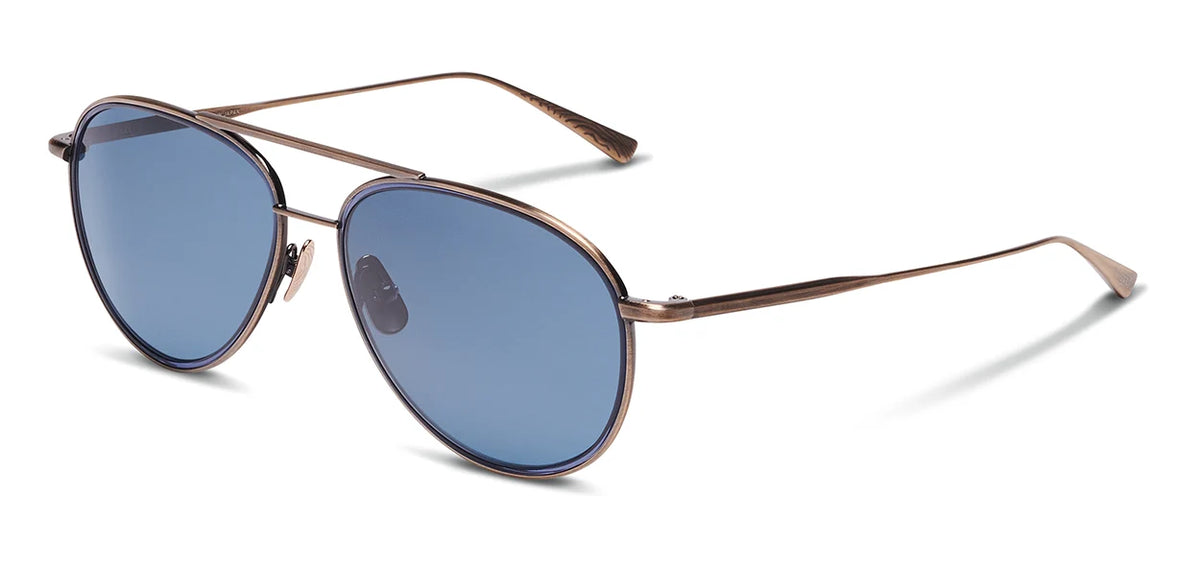 The SALT. Columbia 56 by SALT. are brown metal aviator sunglasses with blue-tinted lenses, made in Japan. Shown on a white background and angled slightly to the right, they feature thin, straight arms with curved ends.