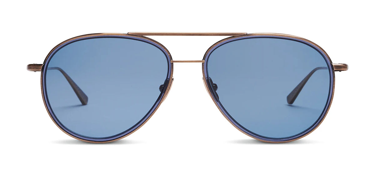 SALT. Columbia 56 aviator-style sunglasses by SALT., crafted in Japan, feature thin metal frames, blue-tinted lenses, and an acetate insert for enhanced comfort and durability. Displayed against a white background.