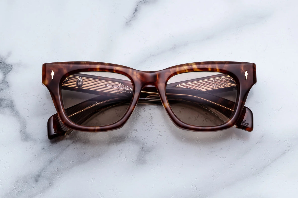 Jacques Marie Mage Dealan rectangular tortoiseshell sunglasses in the style of ’60s eyewear, featuring gold-tone interior metal detailing.
