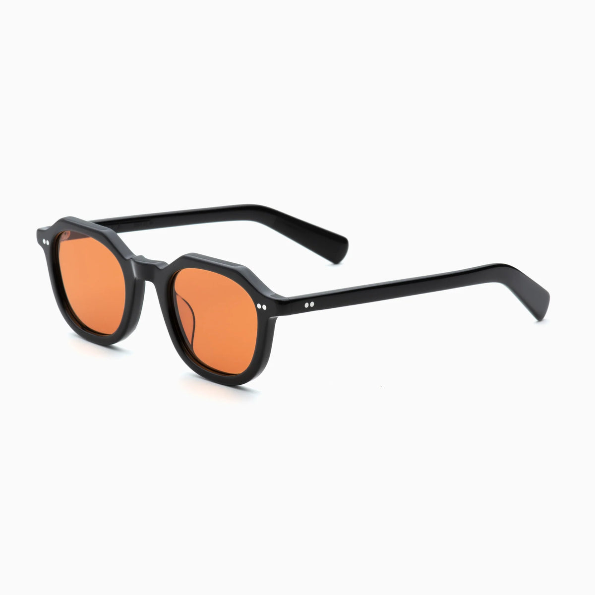 Akila Eira sunglasses by Akila, featuring black frames and round, orange-tinted lenses inspired by mid-century French crown panto style, are displayed on a white background and angled slightly to the right.