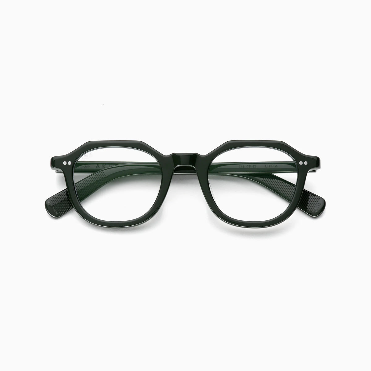 The Akila Eira optical frames by Akila feature a black, round silhouette inspired by mid-century French crown panto designs, with subtle silver accents on the outer corners. Displayed on a white background, these eyeglasses also include blue light blocking lenses for enhanced comfort.