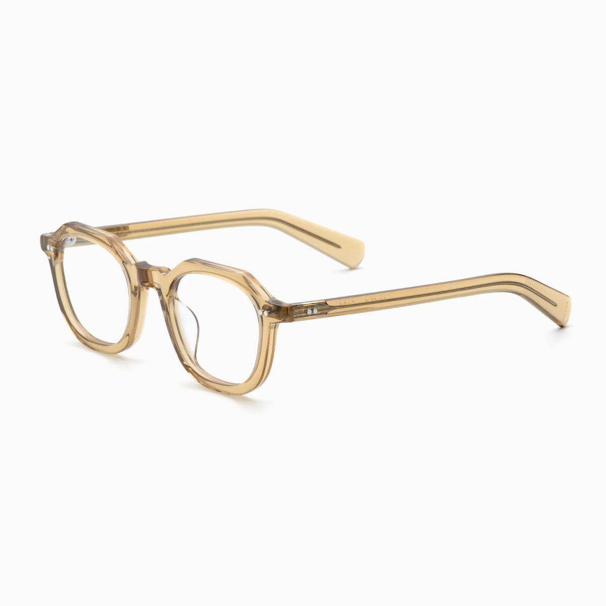 The Akila Eira by Akila features clear yellowish-brown translucent optical frames with round lenses and bold, geometric silhouettes, inspired by the classic French crown panto style, showcased from a three-quarter angle against a plain white background.