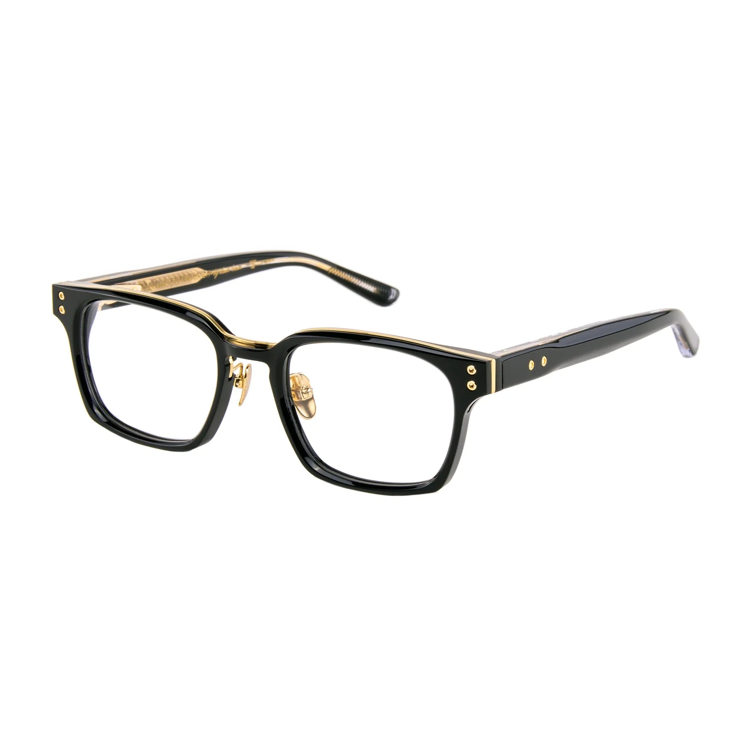 Introducing the Leisure Society Equense by Leisure Society—black, square-framed eyeglasses with gold accents and clear lenses, featuring metal nose pads and decorative gold hinges on the temples. Expertly handcrafted in Japan from premium cotton-based Japanese Zyl acetate, these eyeglass frames are displayed on a white background.