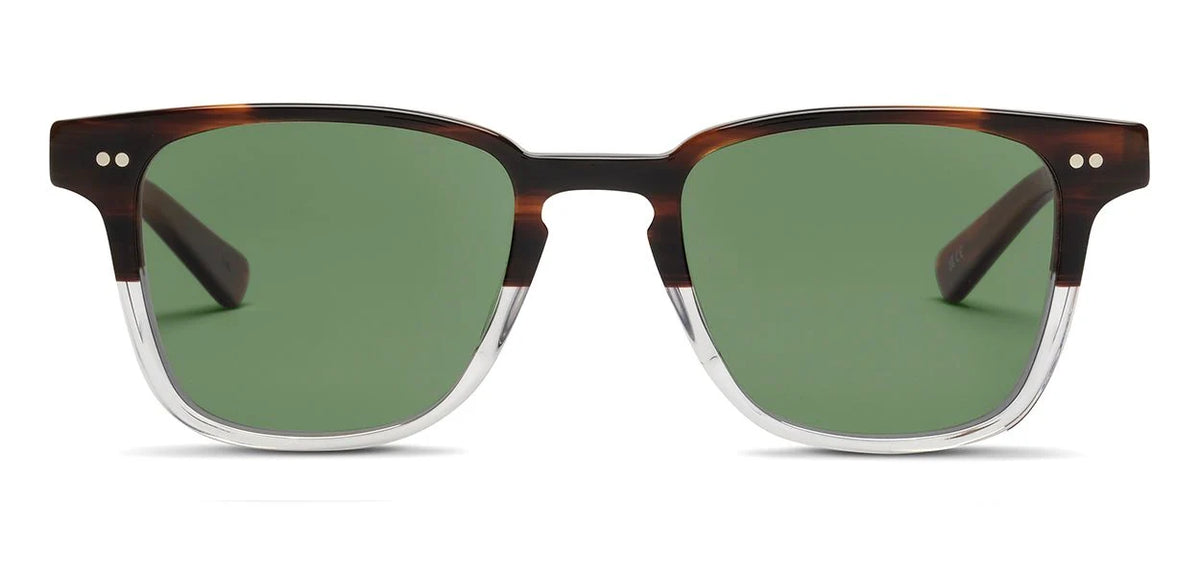The SALT. Reiner by SALT. features square sunglasses with green polarized glass lenses, a brown tortoiseshell pattern on the top half of the frame, and clear Japanese acetate on the bottom half. The design is finished with two silver dot accents on each side near the hinges and includes an anti-reflective coating for enhanced comfort and clarity.