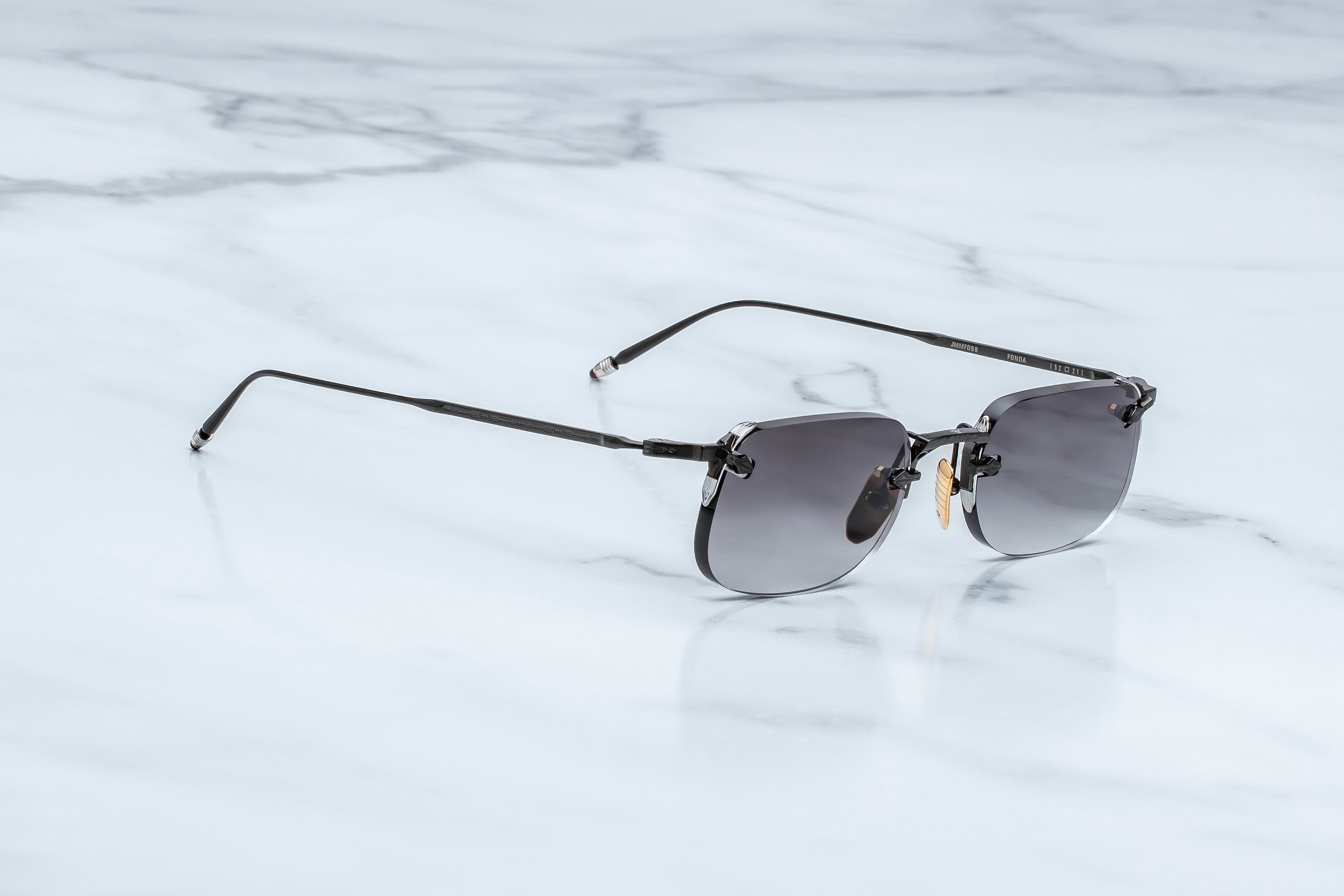 Black oval sunglasses on a white background