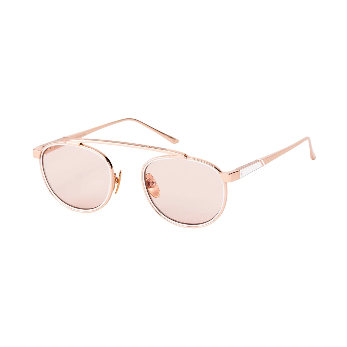Leisure Society Geiger sunglasses featuring a rose-gold frame with a double bridge and light-tinted luxury photochromic lenses.