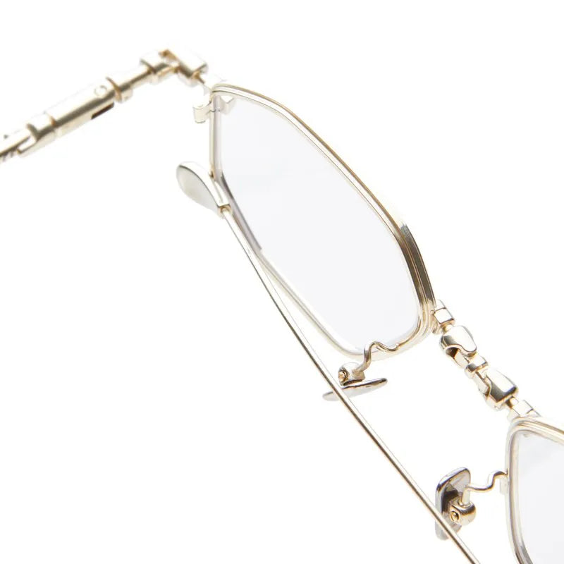 Gold-framed eyeglasses on a white background