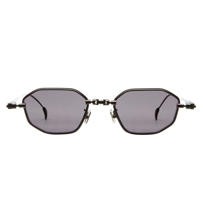 The Kuboraum H66 sunglasses by Kuboraum feature a black geometric metal frame with dark gray lenses and a distinctive angular design. Handcrafted in Italy, these sunglasses are displayed facing forward against a white background.