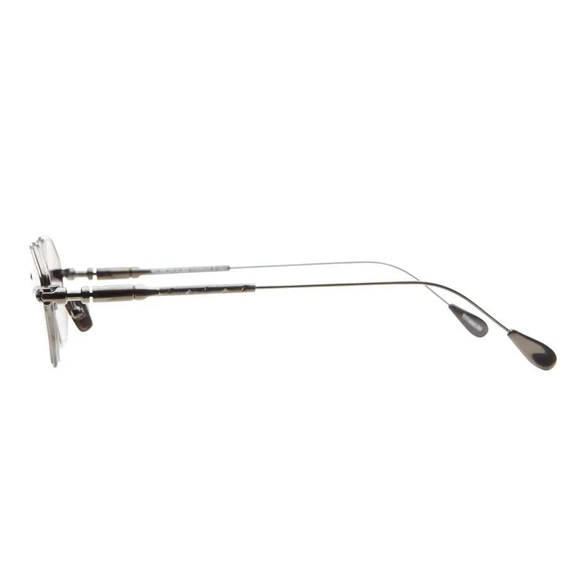 Side view of the Kuboraum H66 rimless designer eyewear by Kuboraum, featuring thin metal arms with black tips, handmade in Italy and photographed against a white background.