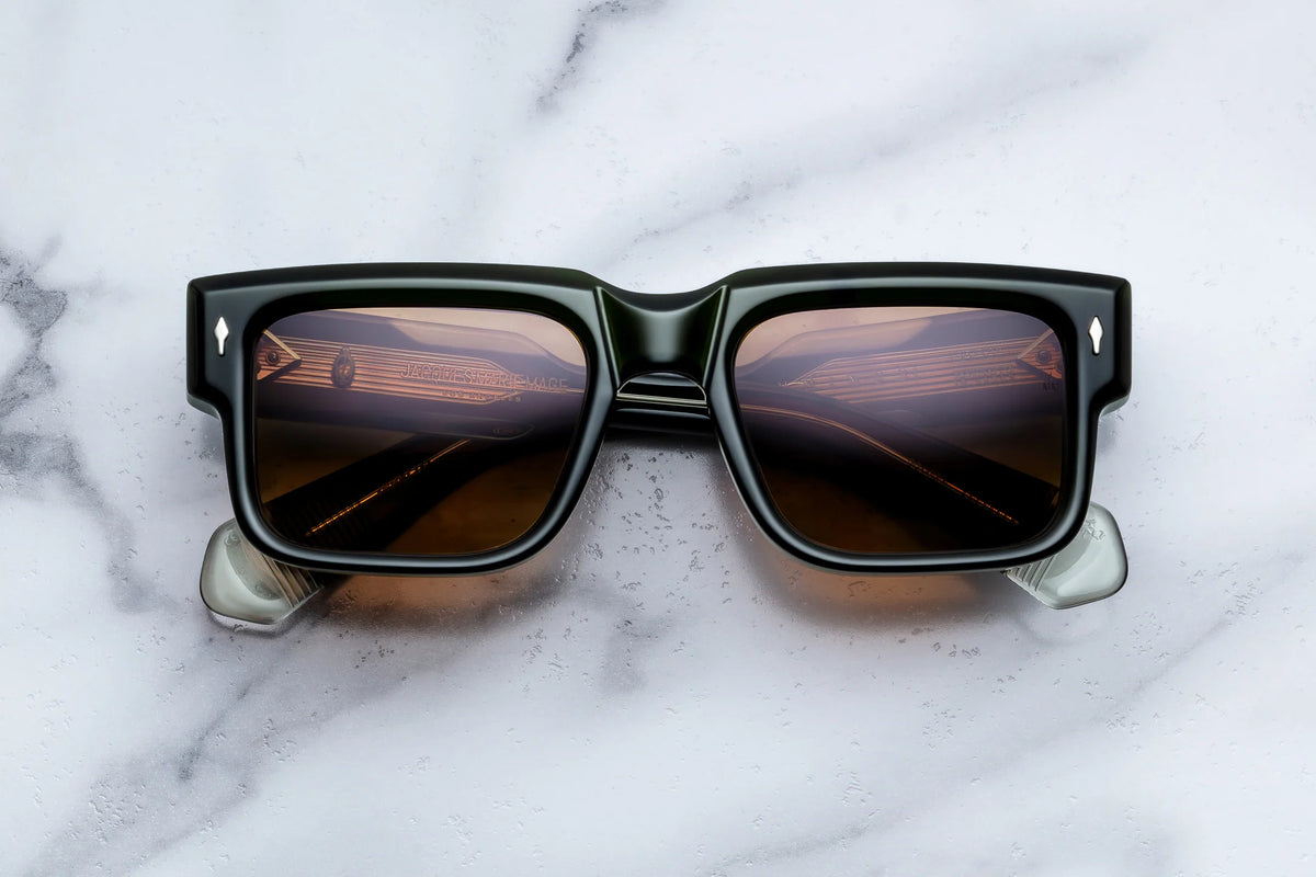 Jacques Marie Mage Hemmings dark green rectangular sunglasses with brown gradient lenses, capturing a 60s-inspired sophisticated eyewear aesthetic.