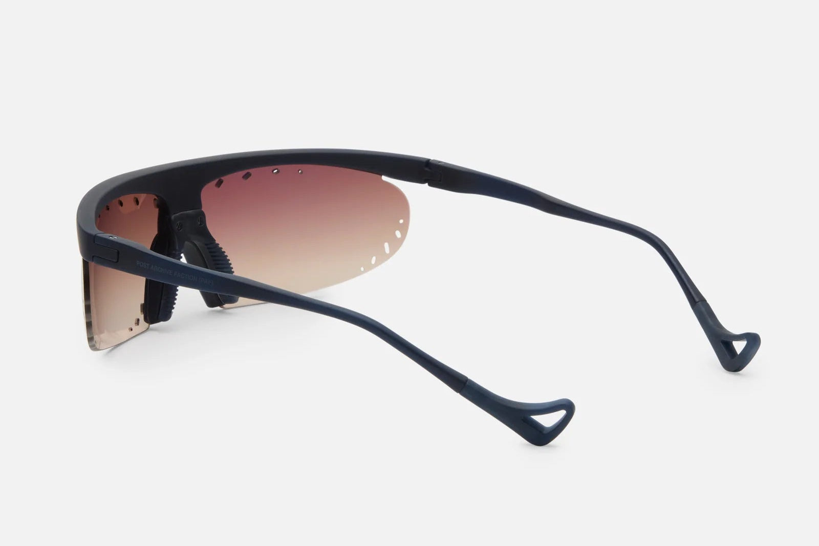 Black sunglasses with gradient lenses on a white background