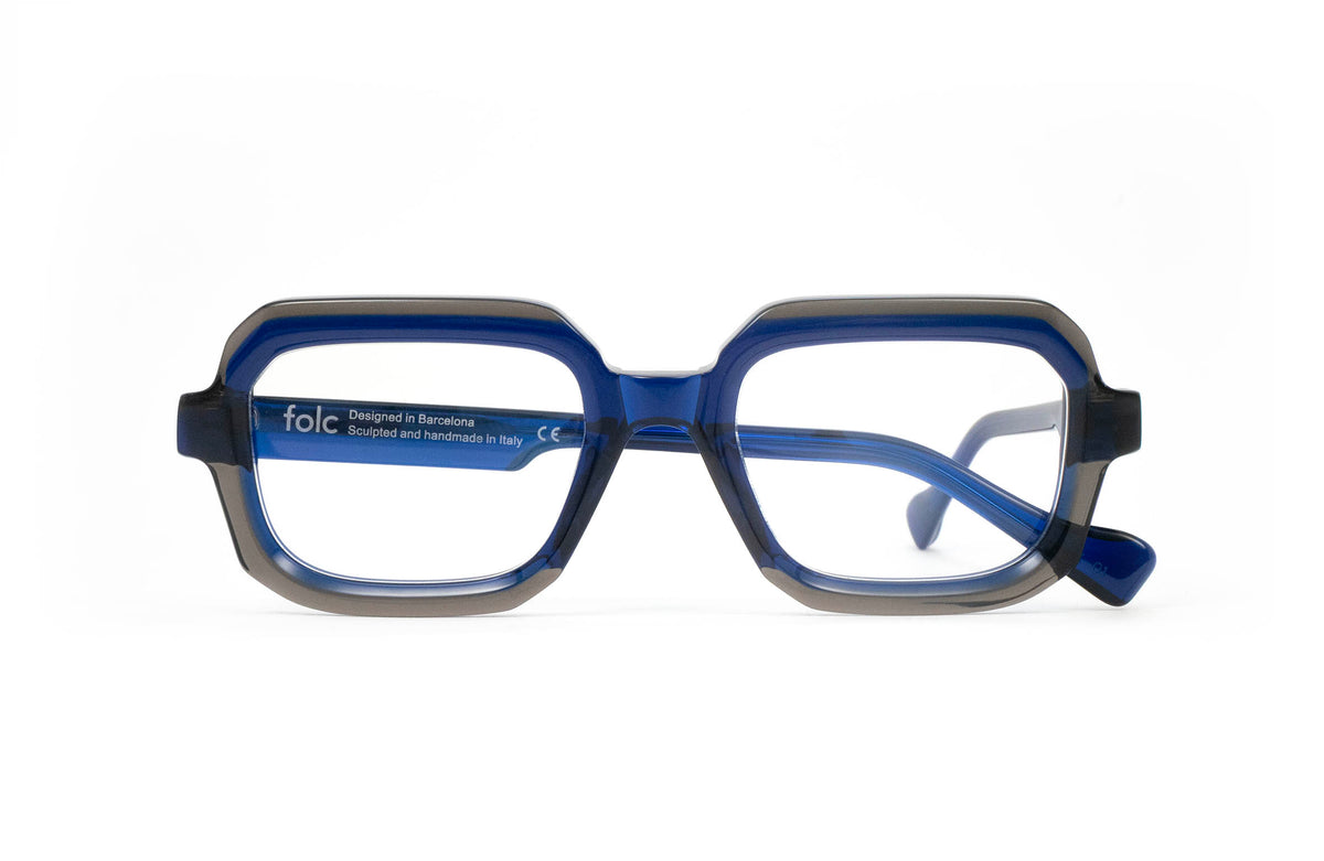 Folc Lapso contemporary, Italian-made acetate eyeglasses featuring translucent blue and grey geometric frames.