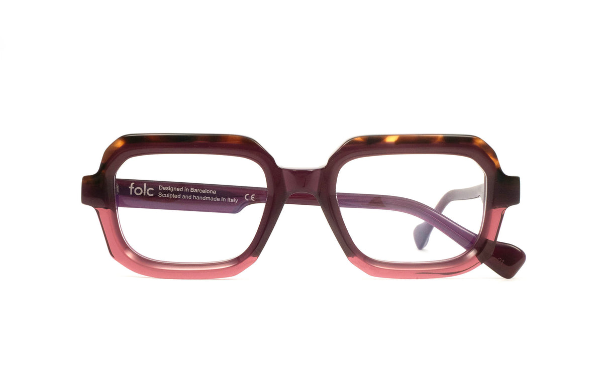 Folc Lapso contemporary Italian-made acetate eyeglasses featuring a thick, rectangular frame in tortoiseshell and translucent pink.