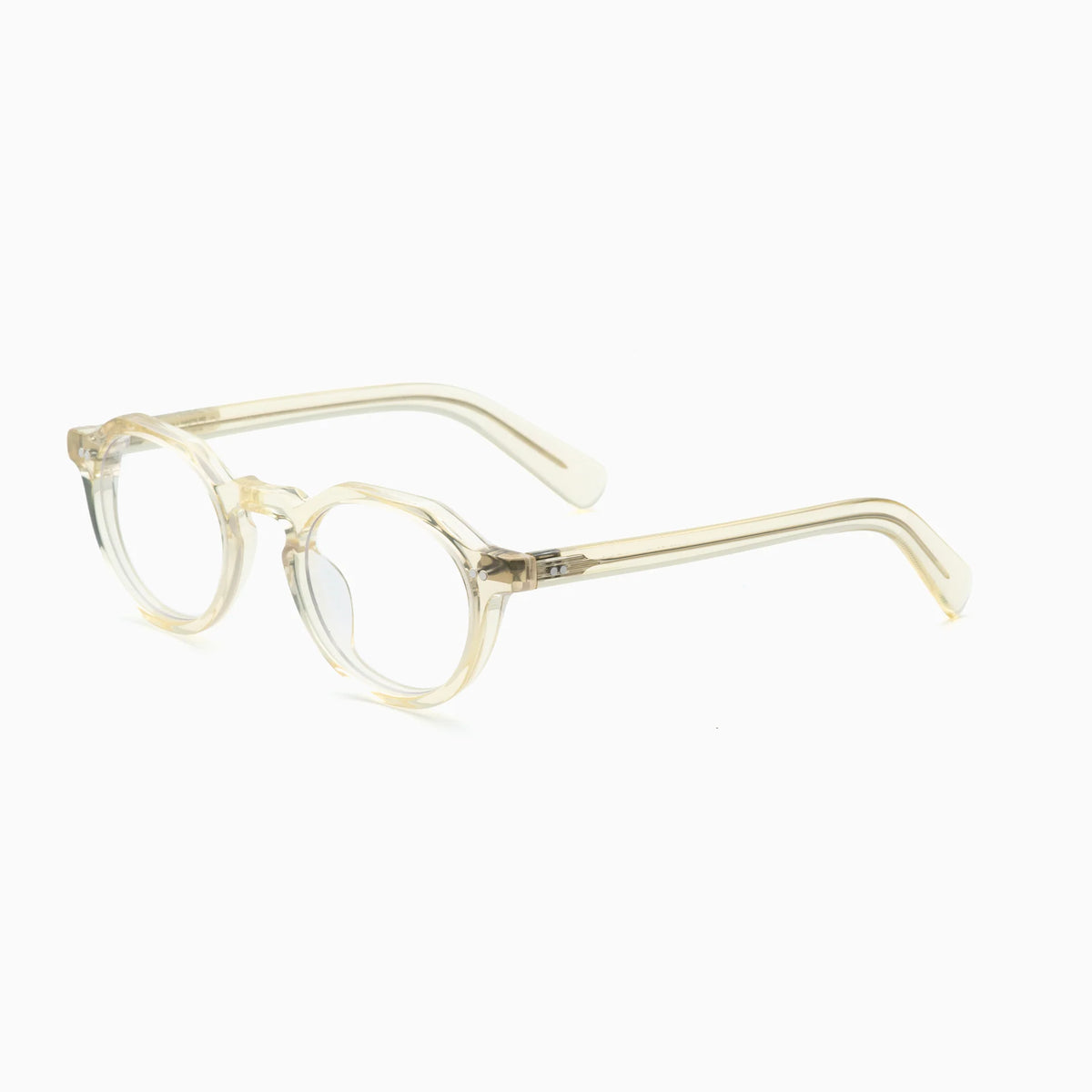 The Akila Lola eyeglasses by Akila feature clear, round lenses with thick, transparent frames and arms, offering a modern spin on contemporary eyewear. Shown on a white background at an angle, both the lenses and the sides of the frame are highlighted.