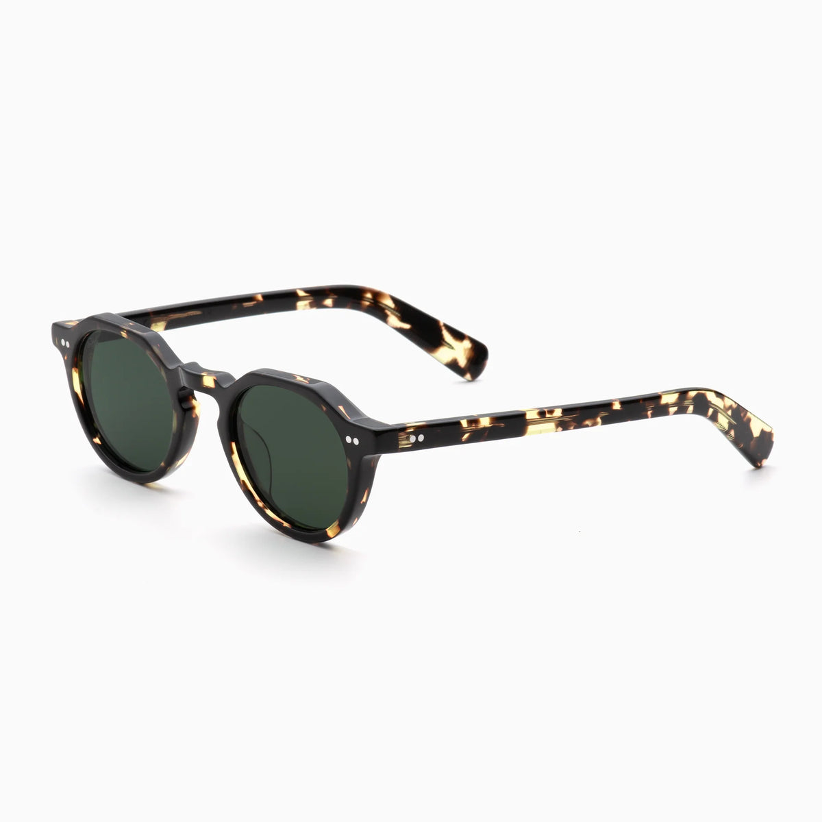 Akila Lola round sunglasses by Akila, featuring green lenses and a tortoiseshell-patterned frame with paddle-shaped temples, are displayed on a white background at a slight angle.