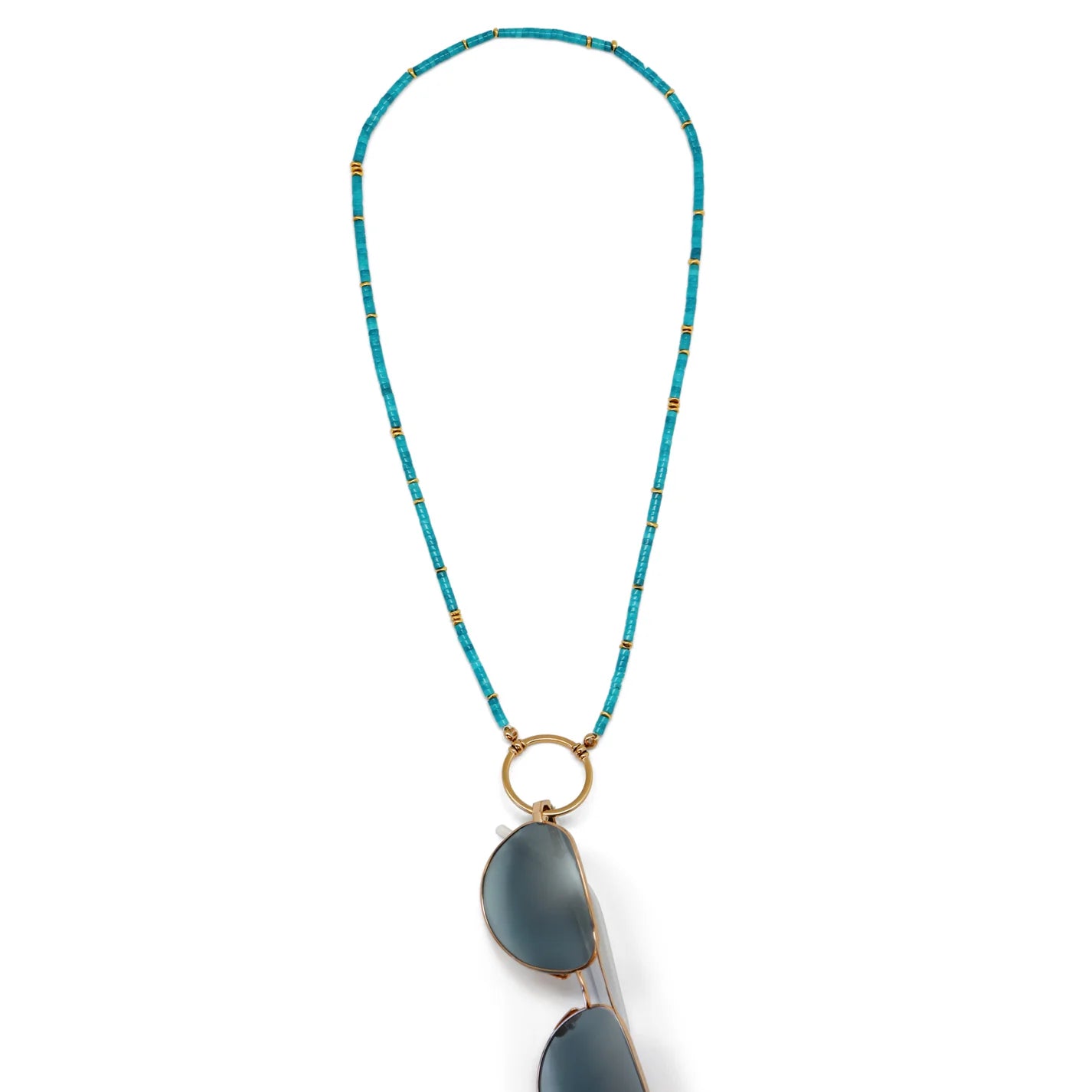 Necklace with blue beads and a pendant on a white background