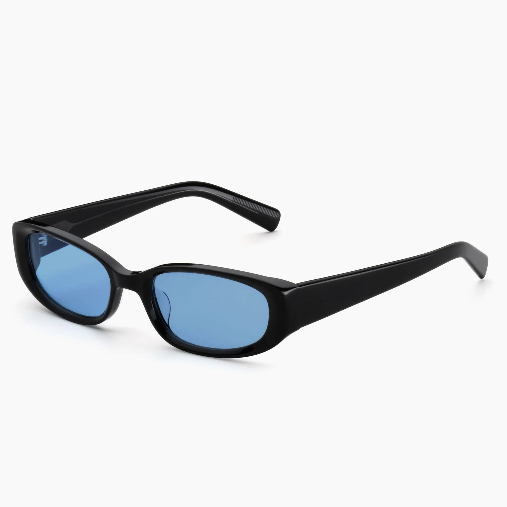 Black cat-eye sunglasses with blue tinted lenses, shown at a three-quarter angle on a light gray background.