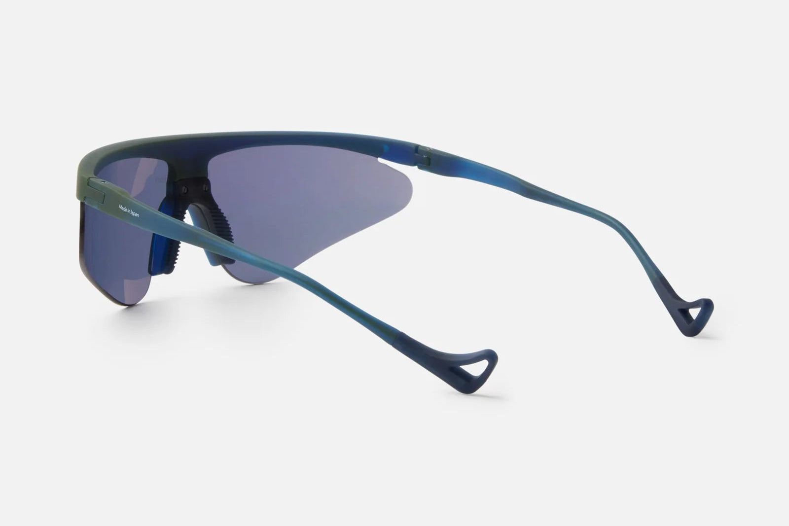 District Vision Momoka Pacer sunglasses by District Vision in blue and green, featuring ergonomic wraparound mirrored lenses made from shatterproof polycarbonate, shown from the side and back on a plain white background.