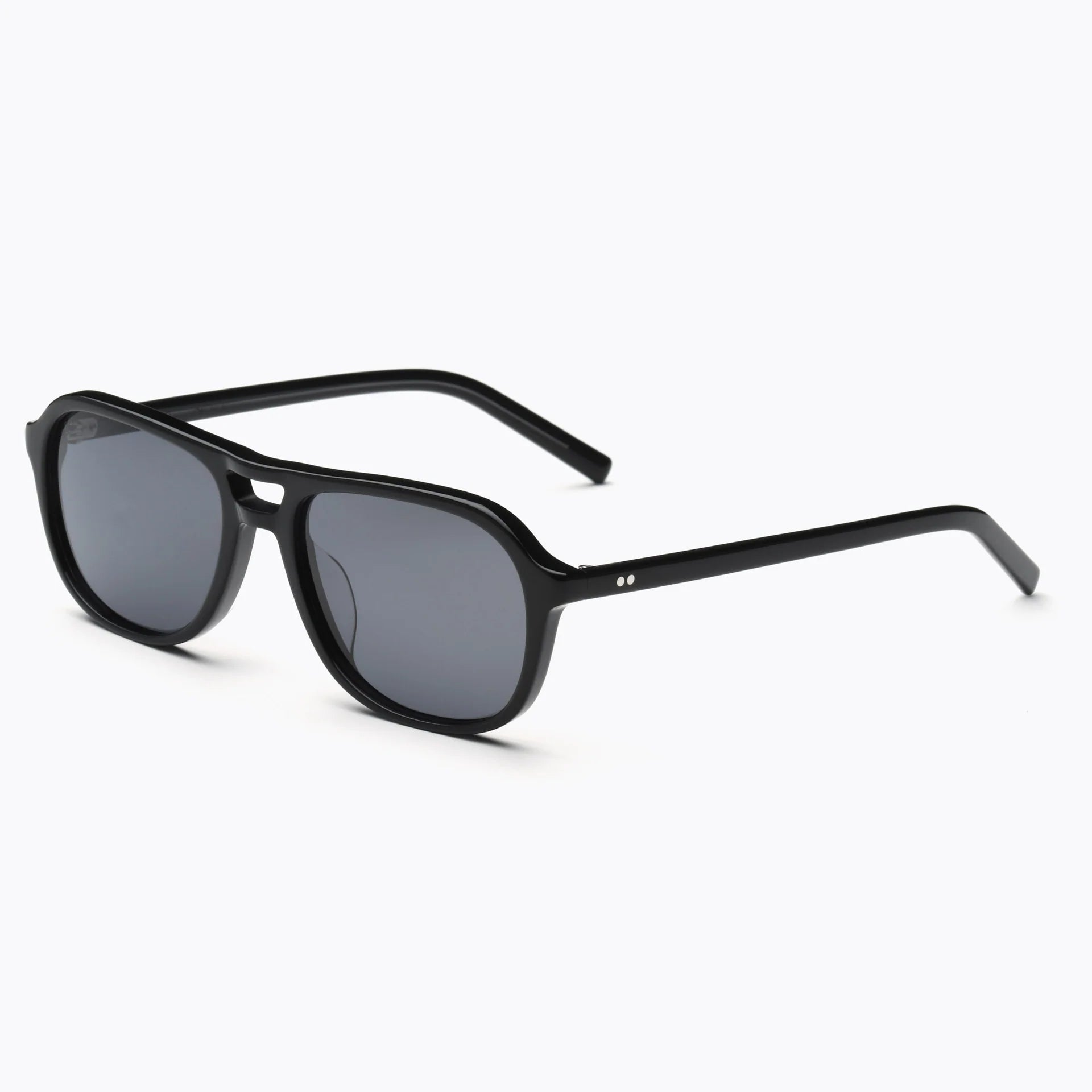 Black sunglasses with dark lenses on a white background