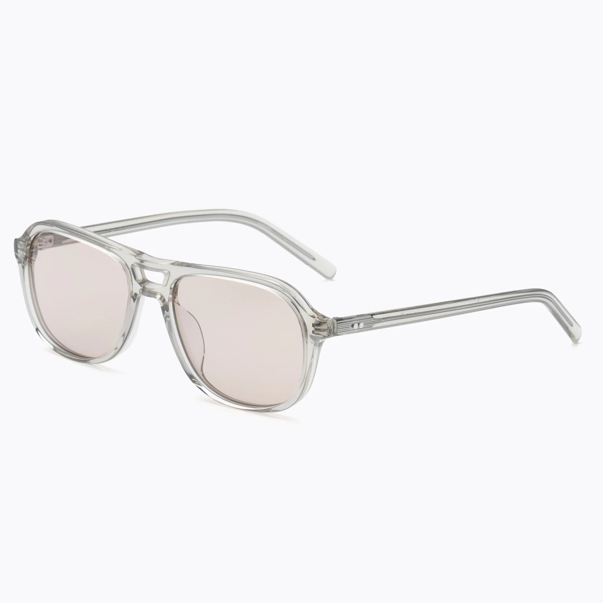 Clear frame sunglasses with light pink lenses on a white background