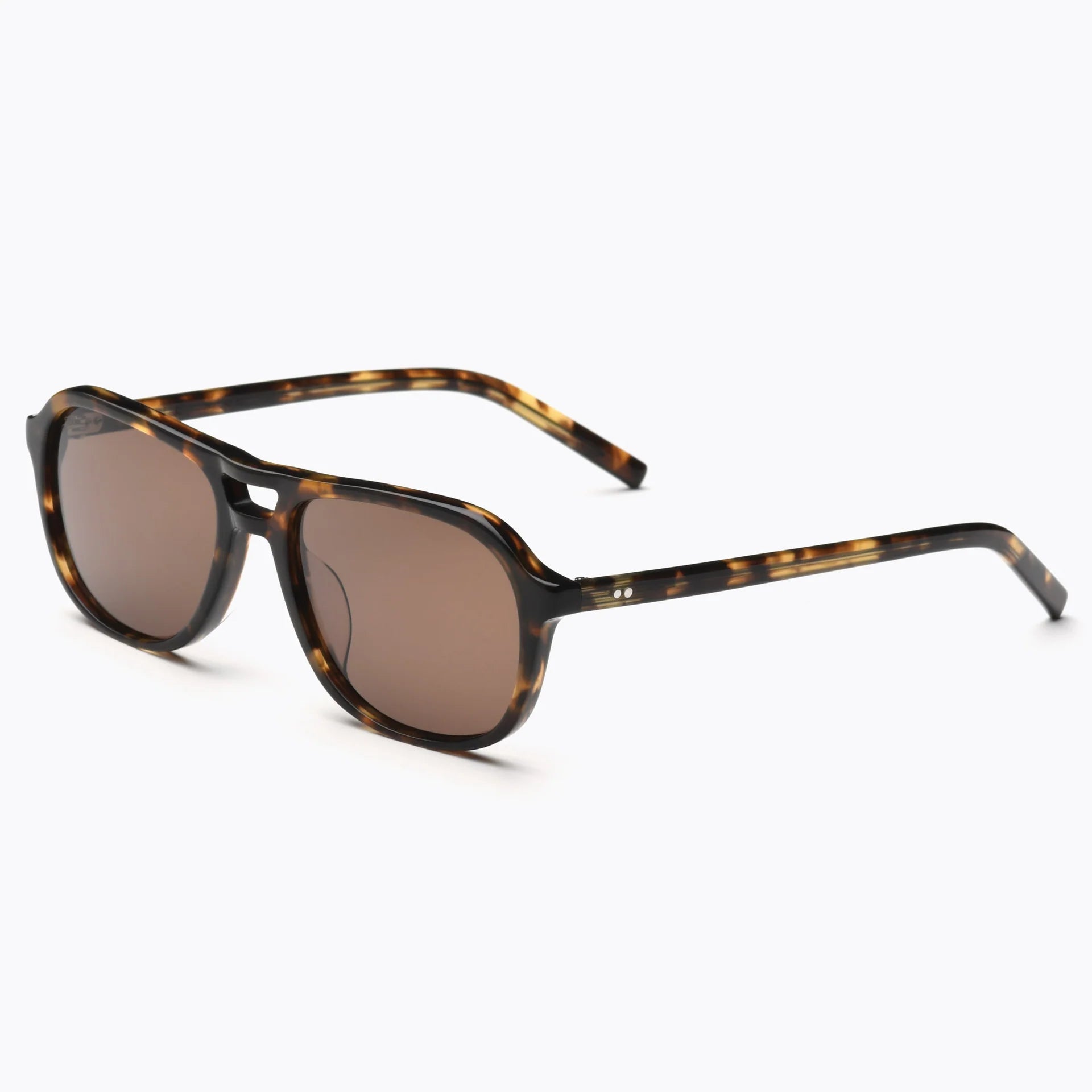 Sunglasses with tortoiseshell frame and brown lenses on a white background